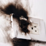 Outlet damage or burning odors require an emergency electrician.